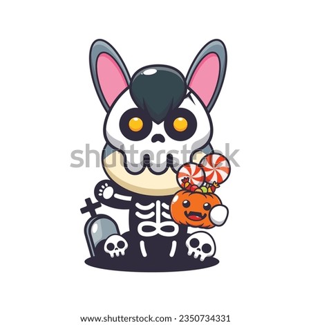 Donkey with skeleton costume holding halloween pumpkin. 