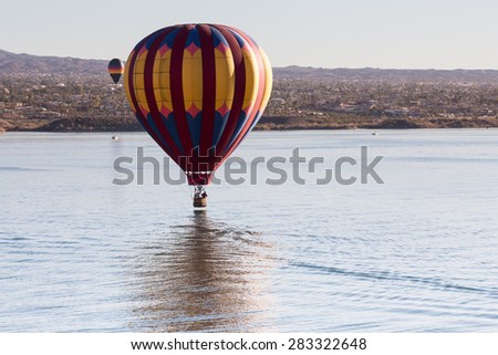 A Hot Air Balloon Touches down on the water