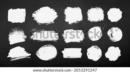 Collection of chalked grunge vector hand drawn banners isolated on chalkboard background. Foto d'archivio © 