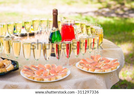 Wedding party buffet with champagne, canape, sandwiches