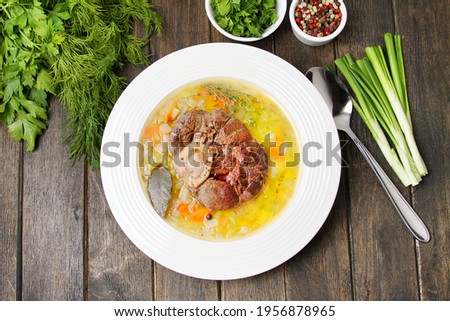 Marrow Bones Broth Soup With Cabbage On Wooden Board, Grey Background. Traditional Russian Schi. Flat Lay, Copy Space. Imagine de stoc © 