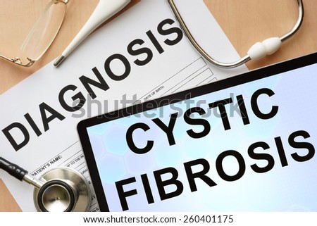 Tablet with diagnosis cystic fibrosis  and stethoscope.