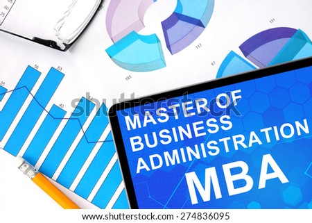 Tablet with word  MBA - Master of Business Administration and graphs. Concept photo.