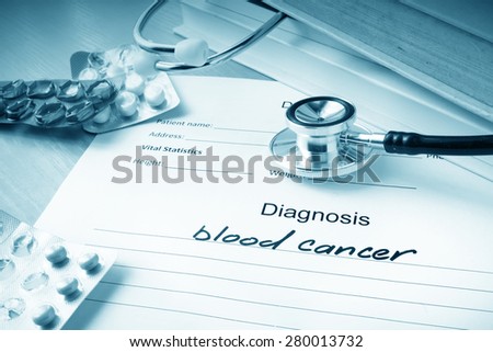 Diagnostic form with diagnosis blood cancer and pills.