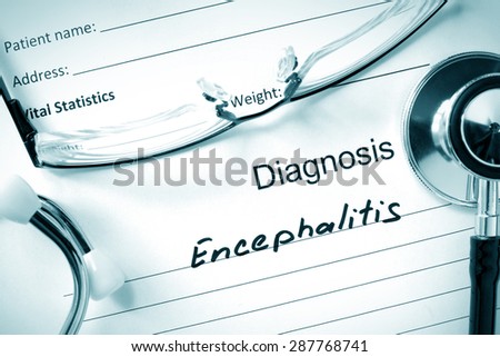 Form with diagnosis Encephalitis and tablets. Medical concept.