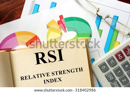 Words Relative Strength Index - RSI written on a book. Business concept.