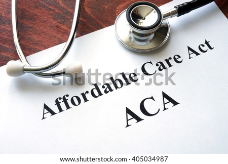 Words Affordable Care Act  ACA written on a paper. Imagine de stoc © 