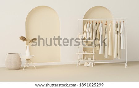 Clothes on grunge background, shelf on cream background. Collection of clothes hanging on a rack in neutral beige colors. 3d rendering, store and room concept