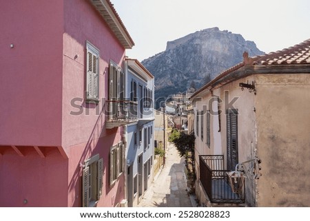 Similar – Image, Stock Photo Picturesque view narrow route between verdant plantations on hills and small village in Malaysia