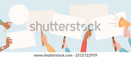 Protest signs are held high by a diverse hands. People raise placards and banners with a strong message. Human hand lift blank boards, showing unity, solidarity and support in the demonstration.