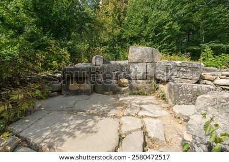 Image, Stock Photo Carefully stacked old building blocks in the shade of old trees in front of a wooden hut on a farm in Rudersau near Rottenbuch in the district of Weilheim-Schongau in Upper Bavaria, photographed in neo-realistic black and white