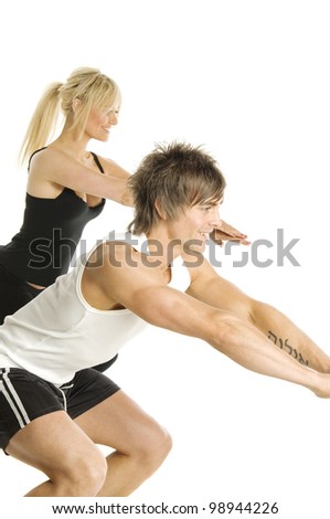 Muscular man and pretty blonde woman doing cardio exercises isolated on a white background