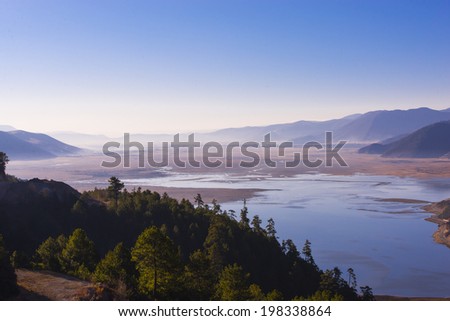 East Asia, China southwest area, Yunnan Province, in the early morning, the river calm through the valley
