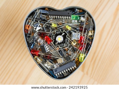 The heart of electronic technology - metal heart with electronic elements
