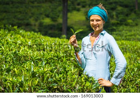 Beautiful woman in the tea plantation