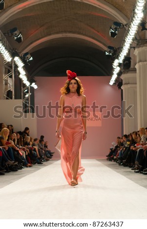 KIEV, UKRAINE - OCTOBER 16: Fashion model wears clothes created by 
