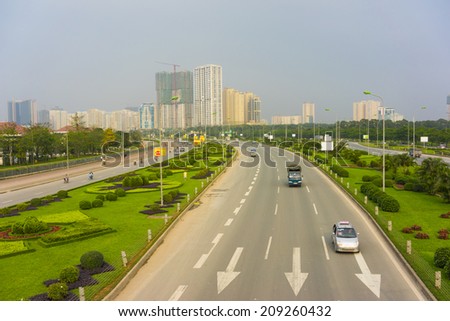 Hanoi, Vietnam - April 13, 2014: Traffic on Thang Long multiple lane highway in Hanoi, Vietnam