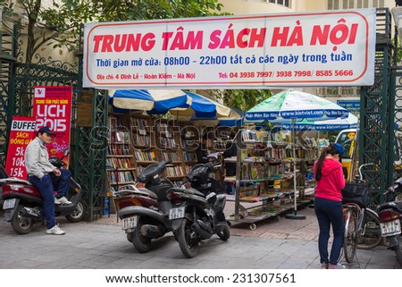 Hanoi, Vietnam - Nov 16, 2014: Exterior view of book store named Hanoi book Center in Dinh Liet street. Selling on sidewalk is common in Hanoi, Vietnam