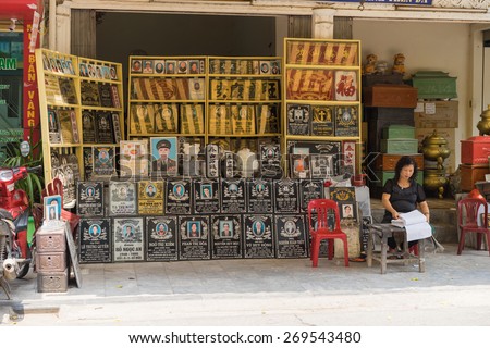 Hanoi, Vietnam - Apr 5, 2015: Exterior front view of a stone portray carving store in Hang Mam street