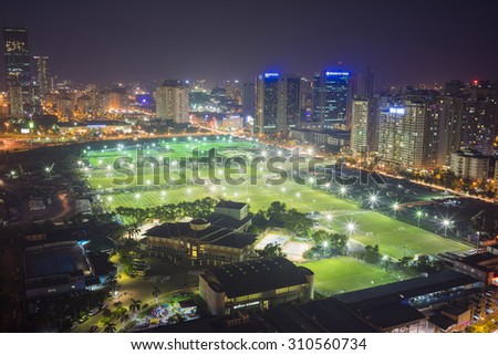 Aerial view of football grounds in Hanoi at night. Cau Giay district