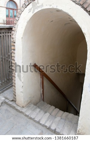 Traditional uzbek stairs with handrail. Architecture detail. Uzbekistan, Central Asia. Shutterstock - PuzzlePix