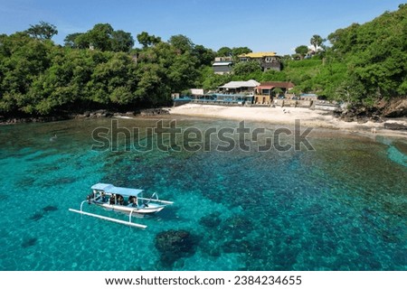 Similar – Amazing blue lagoon with cliff archway