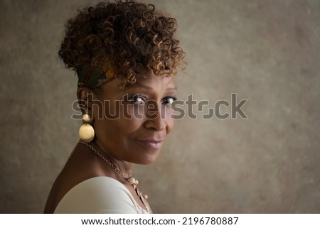 Similar – Image, Stock Photo 60 year old lady with scarf in autumn landscape