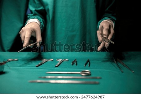 Similar – Image, Stock Photo Medical staff performing surgery in modern clinic