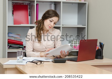 Director of reading an important document