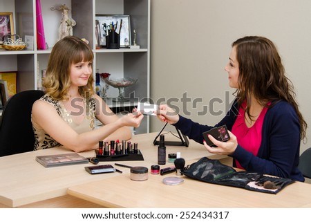 Beauty consultant business card transmits office staff
