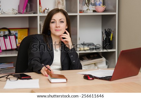 Head girl at desk in the office