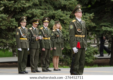 Volgograd, Russia - may 07, 2015: Cadet young guard in guard of honor, against four cadets