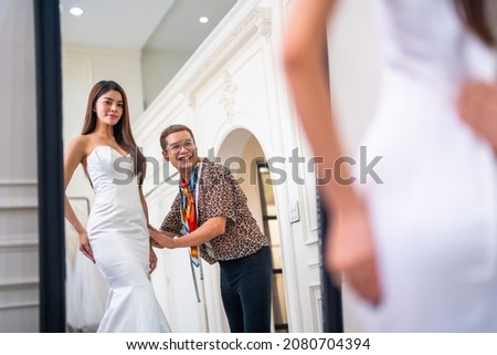 Similar – Image, Stock Photo bride trying on white wedding dress