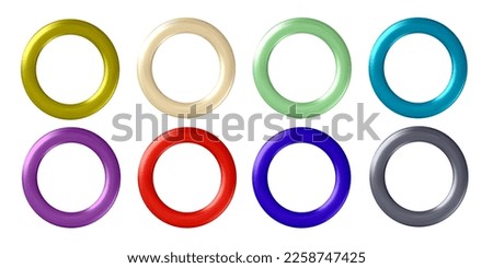 A set of multicolored metal or plastic rings or rivets for curtains, clothing, paper, stickers or tags. 3d vector illustration  isolated on white background.