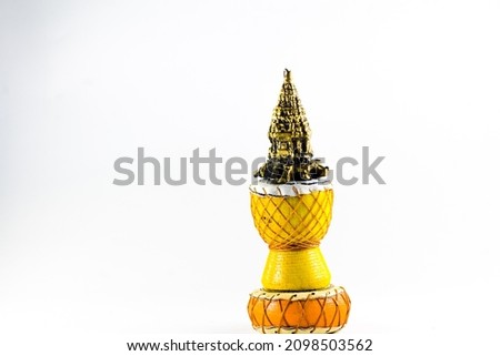 replica of the pointed tip tower on an isolated white background. statue of liberty torch replica. Photo stock © 
