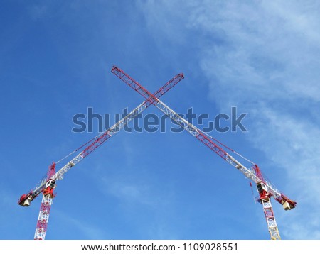 Similar – Image, Stock Photo Two cranes crossed