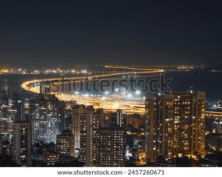 Similar – Foto Bild In der Dunkelheit leuchtet eine Brücke. Sie spiegelt sich im stehenden Wasser eines Flussnebenarms.