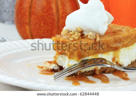 Slice of Double Layer No Bake Pumpkin Pie made with pumpkin, vanilla pudding,cream cheese, and whipped cream.