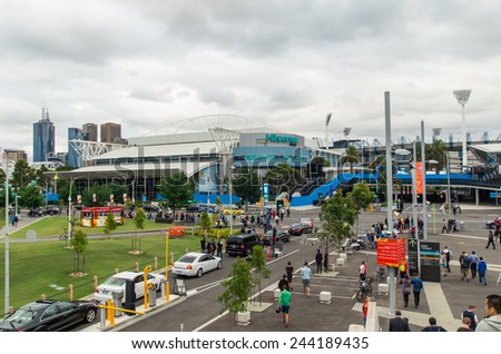 MELBOURNE, AUSTRALIA - January 14, 2015: football fans after the Asian Cup match between Saudi Arabia and DPR Korea. In the background is Melbourne Park, venue of the Australian Tennis Open
