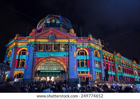 MELBOURNE, AUSTRALIA - February 22, 2014: projections of images onto the facade of Flinders Street Station during the White Night arts festival.