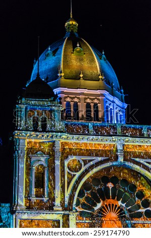 Melbourne, Australia - February 22, 2015: facade of the Royal Exhibition Building illuminated by light projections during the White Night overnight arts festival.