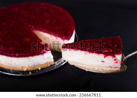 berry cheesecake, black background