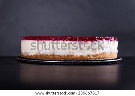 berry cheesecake, black background