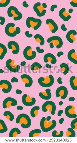 a vibrant leopard print motif with dark green and orange spots on a pink background, representing bold and trendy abstract design.