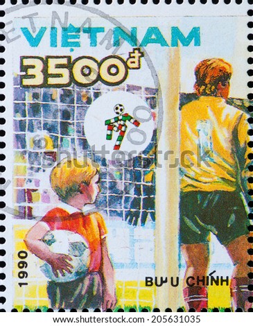VIETNAM - CIRCA 1990: A stamp printed by Vietnam shows football players. World football cup in Italy, series, circa 1990