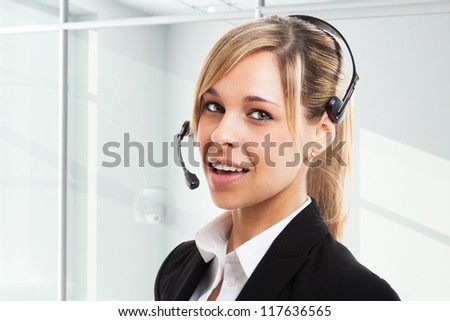Portrait of a smiling  beautiful customer representative