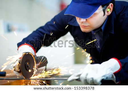 Similar – Image, Stock Photo Blacksmith cutting metal