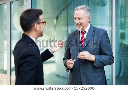 Portrait of business people discussing