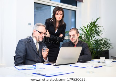 Business people at work in their office
