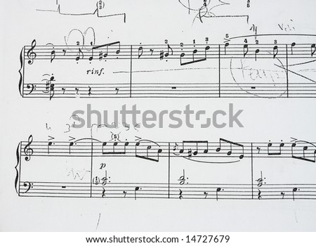 Music sheet with corrections made with pencil.